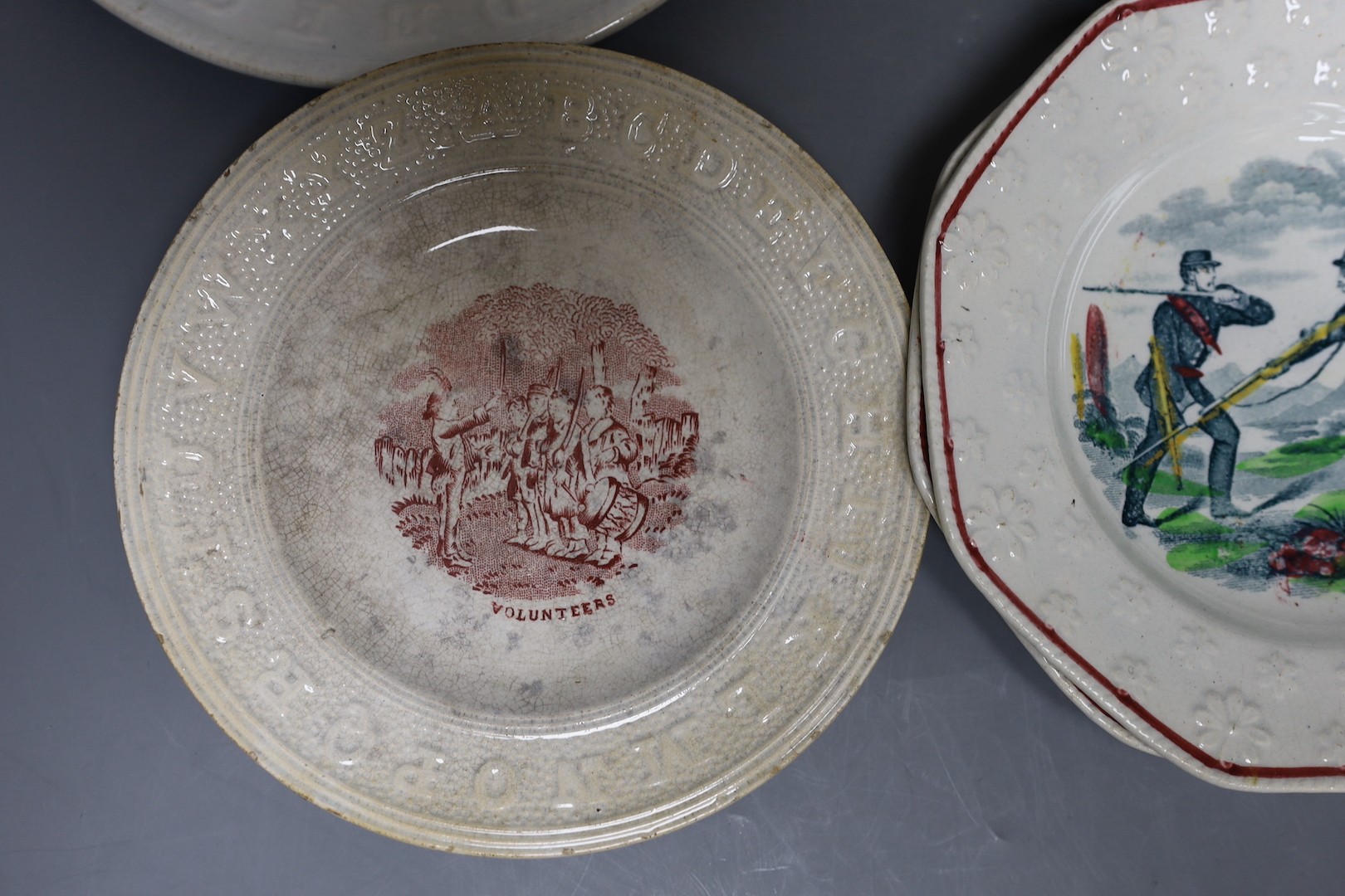 A group of mid-19th century Staffordshire rifle brigade and Crimean war commemorative nursery ceramics, Largest 21 cm